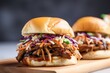 side view of a pulled pork slider with slaw