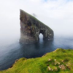 Sticker - The beautiful Drangarnir Arch on the Faroe Islands, Atlantic ocean landscape with cliff