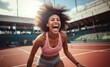 In a triumphant moment at the athletic stadium an African American female athlete with African hair radiates pure joy and success embodying the thrill of achievement after an intense training session
