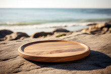 Empty Wooden Round Tray On A Rock With The Beach Background In The Morning, Selective Focus. High Quality Photo