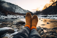 Thermal Socks Hanging Outside A Camping Tent In A Winter Landscape, Essential For Keeping Feet Warm During Outdoor Activities