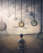 Different hour concept with a person lost in time walking a desolate land stands in front of multiple hanging down clocks has to choose the right moment in life