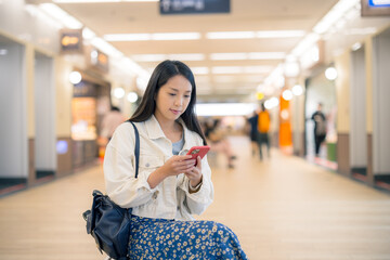 Sticker - Woman use mobile phone in city