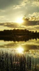 Wall Mural - river sunset beautiful landscape, timelapse. vertical video