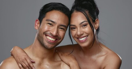 Poster - Couple, smile and care for skincare, face and portrait with moisturizer in studio by gray background. Happy people, dermatology and hug for cosmetics, hydration and natural treatment for interracial