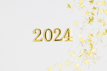 Wall Mural - Golden digits in 2024 number with gold decorations on white background. 2024 new year backdrop. Flat lay, top view, copy space