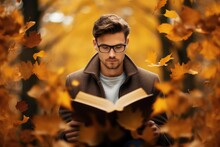 Young Man Lost In A Book, Set Against A Backdrop Of Autumn Leaves - Intellectual Bliss - AI Generated