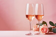Two glasses of rose wine and roses on pink background, romantic still life, Valentine's day, ai generated