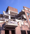 The wreckage of a collapsed building after an earthquake