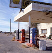 Old abandoned gas station in ghost town