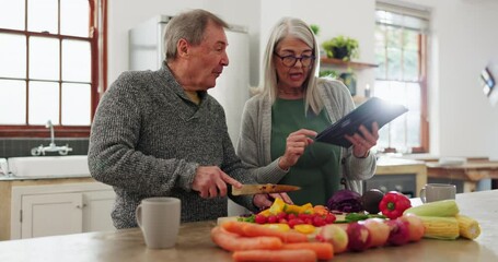 Canvas Print - Senior couple in kitchen, cooking with tablet and help with online recipe for vegetable dinner. Healthy food, old man and woman in home checking digital app on meal prep, diet planning and lunch chat