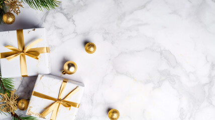 Festive Christmas and new year celebration image white gift boxes with gold ribbons fir branches and gold baubles on a white marble background Christmas banner with copy space Merry Christmas