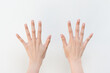 Women showing finger on white background.Counting number ten.