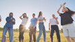 © Довидович Михаил - A group of funny friends dancing in the street.