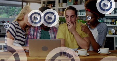 Poster - Animation of graph icons over diverse friends watching video on laptop in cafes