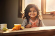 © Neha - Cute indian little girl eating breakfast at home