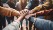 © Ramesh Design - group of people hands together
