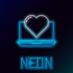 Poster - Glowing neon line Laptop with heart icon isolated on black background. Valentines day. Colorful outline concept. Vector