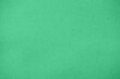 Green corrugated cardboard texture background. Green paper cardboard with a soft color. Blue corrugated cardboard texture is useful as a background.