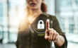 © aLListar/peopleimages.com - Hand point, lock hologram and cyber security with safety, pin and app with biometric on web. Data protection, press and password to stop scam, phishing and malware with woman fingerprint in office