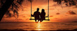 Romantic couple on swing in suset light on the beach.