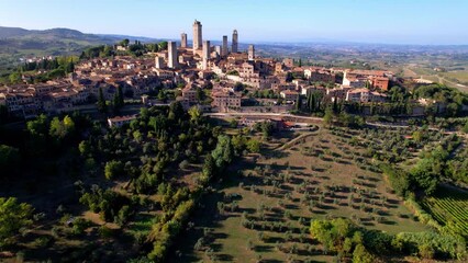 Canvas Print - San Gimignano - one of the most beautiful medieval towns in Tuscany, Italy. aerial drone video of towers . Unesco heritage site