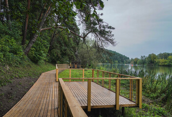 Wall Mural - wooden bridge by the river