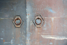 Metal Gates With Handles In The Form Of Rings In A Hexagon