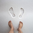 Man walks barefoot in a snowdrift, hardening her body. Hardening for immunity. Body rejuvenation. strengthening immunity