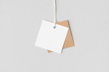 Sticker - White and kraft square clothing tag, gift tag mockup.