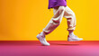 © dinastya - Creative modern hip hop dance banner template for adults, cropped image of dancing person on flat yellow background with copy space.