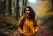 © JuanM - Female hiker hiking in the middle of the forest.
