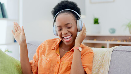 Canvas Print - Dance, headphones or happy black woman on sofa for music streaming, mental health or wellness. Energy, couch or fun African person listening to audio technology and singing a hip hop song to relax