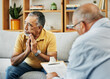 © aLListar/peopleimages.com - Sad senior man talking to psychologist at mental health, psychology and therapy clinic for session. Psychological therapist with clipboard for counseling checklist with elderly male patient in office