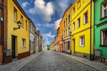 Poster - Old houses and stone pavement in the historical town district