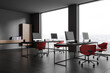 © ImageFlow - Grey corporate interior with pc monitors on shared table and shelf, window
