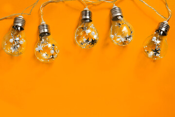 Canvas Print - Light bulbs on orange