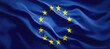 Waving flag of European Union. Circle of stars on a dark blue background.