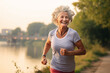 © toonsteb - Healthy senior woman jogging at the riverside