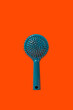 © ADDICTIVE STOCK - Hair brush on orange surface