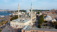 Drone View Of Eminonu Yeni Cami District Of Istanbul In Turkey Or New Mosque. Architecture Of Ottoman Mosque. View From Height Or Air Of Former Constantinople. Tourist Place Tourists. Religion Islam.