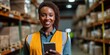 african american woman worker in a hardware warehouse standing checking supplies on his tablet. generative ai