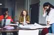 © BullRun - Young diverse students working on project
