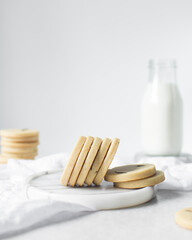 Wall Mural - sugar cookies on a marble tray, stack of rosemary cookies on a white background, no spread round sugar cookies