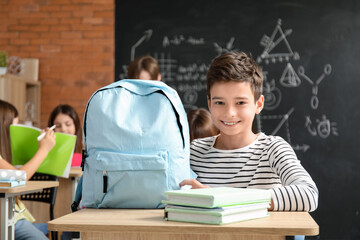 Sticker - Little boy with backpack in classroom