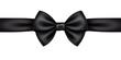 a black ribbon bow on a white background