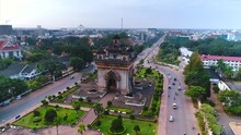Aerial Patuxai Victory Gate Vientiane Laos Flyover Drone Pull Back
