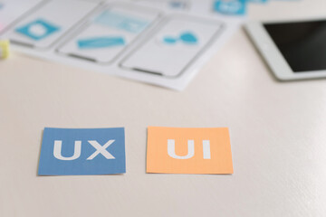 Wall Mural - user experience ux design paper layout on desk, nobody. ux ui concept