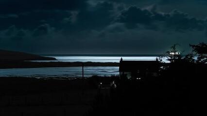 Wall Mural - Time lapse of high tide on a moonlit night on the Isle of Lewis, Hebrides.
