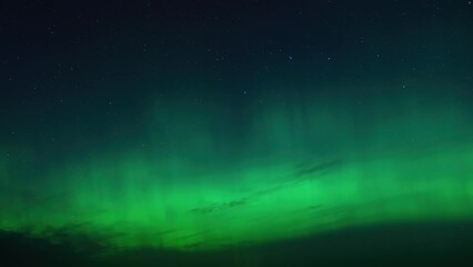 Wall Mural - Time lapse of the aurora borealis over the Isle of Lewis in Scotland.